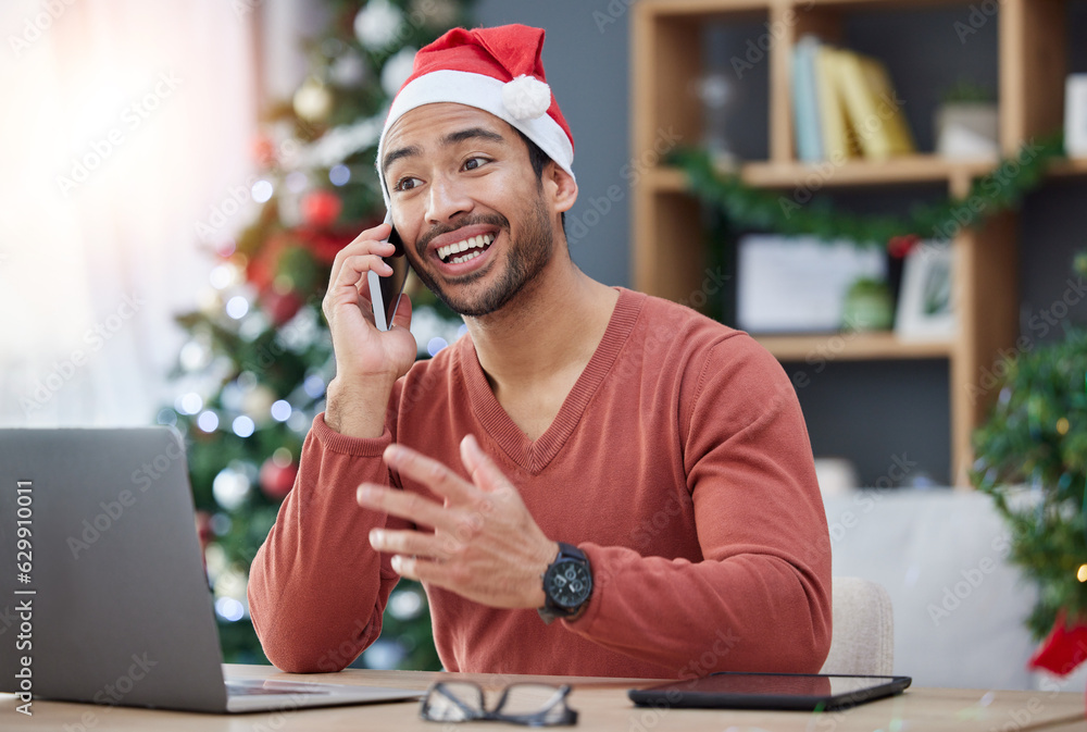 Phone call, christmas hat and man in the office with a laptop on a cellphone for communication. Happ