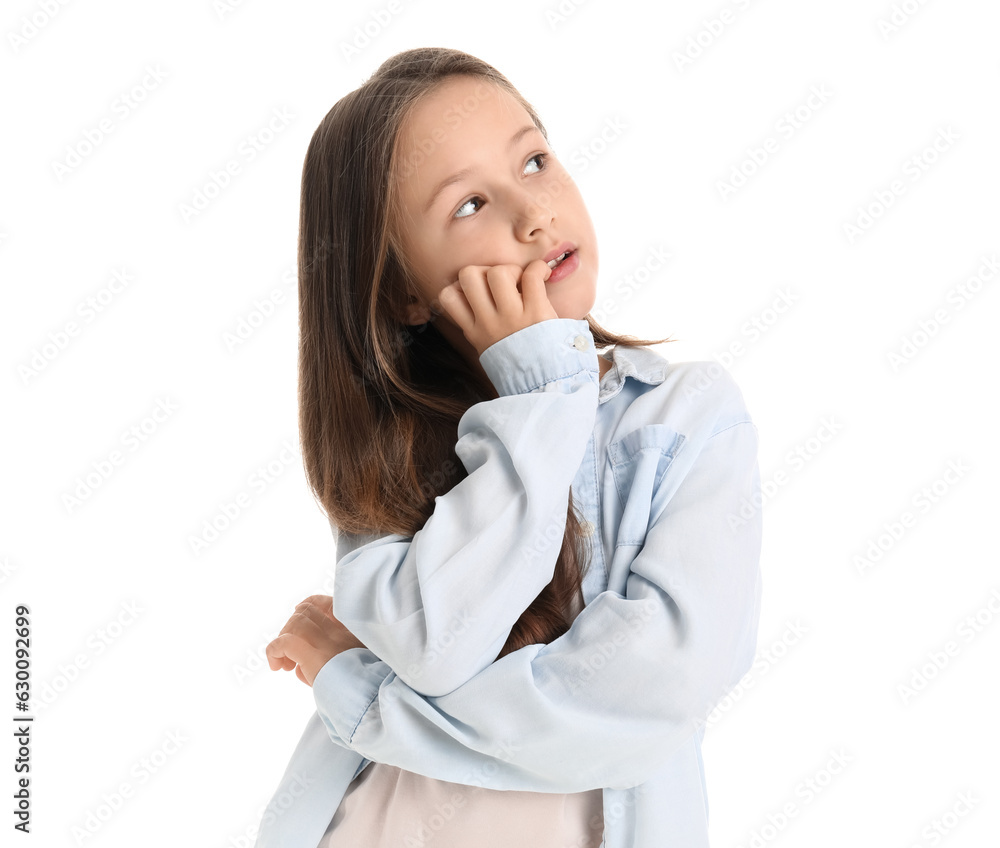 Little girl biting nails on white background