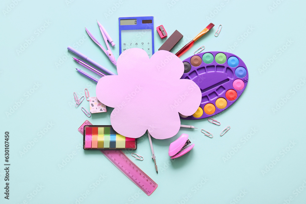 Composition with blank paper sheet and different school stationery on turquoise background