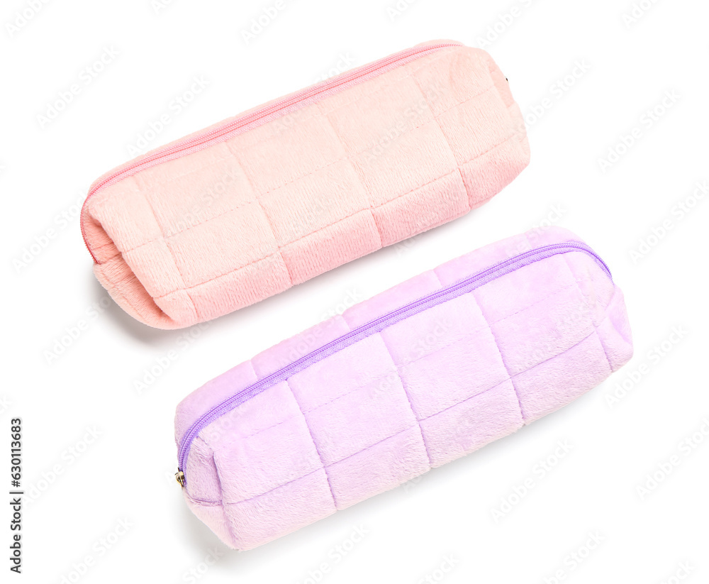 Pencil cases on white background