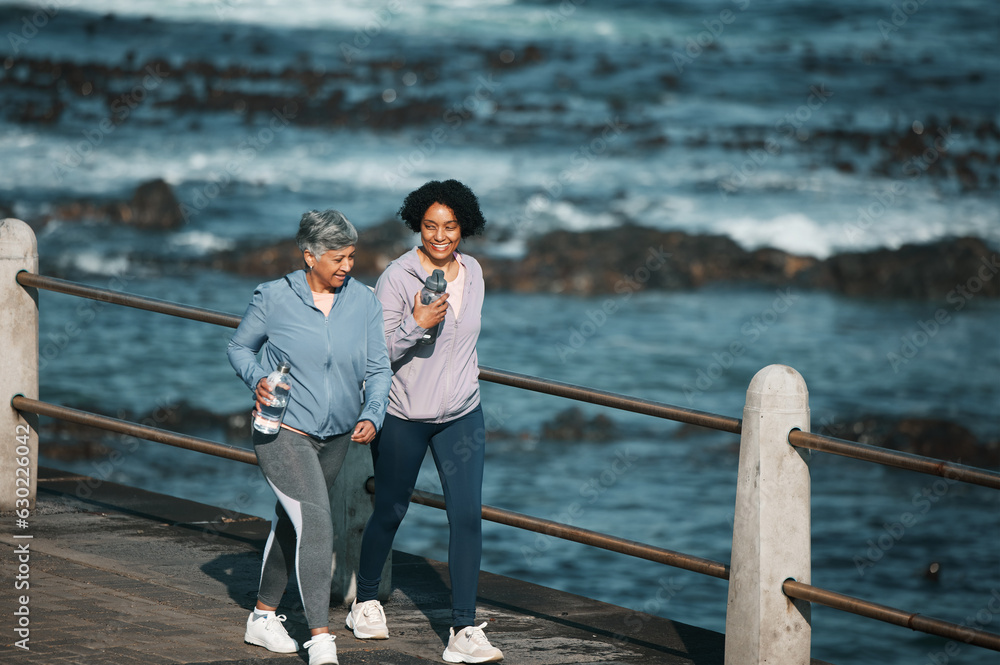 Fitness, walking and woman and senior mother by ocean for healthy body, wellness and cardio on prome