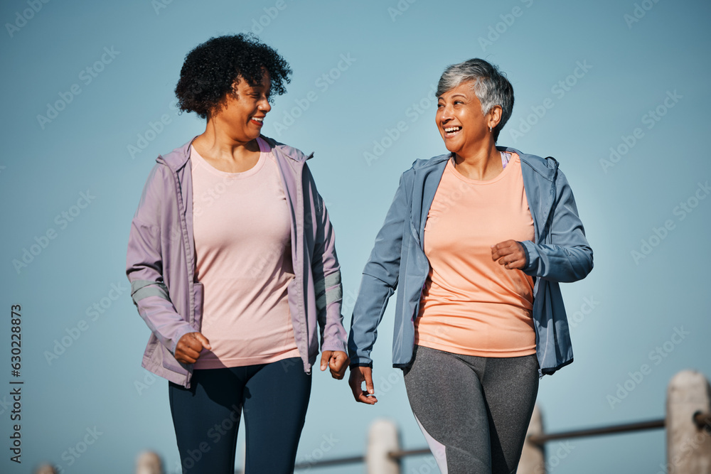 Fitness, exercise and senior women by ocean for healthy lifestyle, wellness and cardio on promenade.