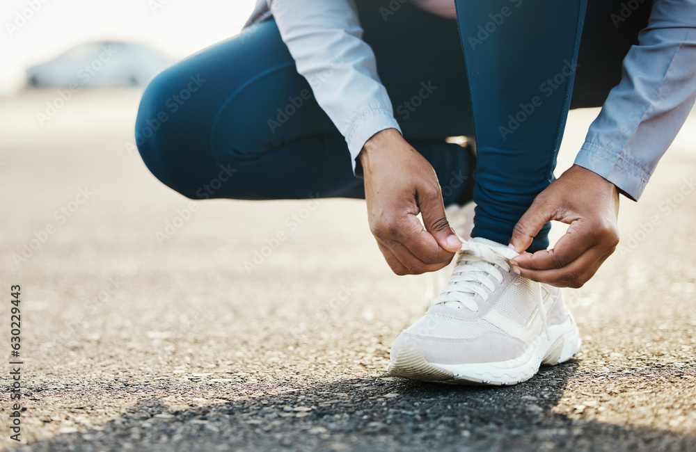 Sports, closeup and woman tie shoes outdoor in the road for running workout in the city. Fitness, he