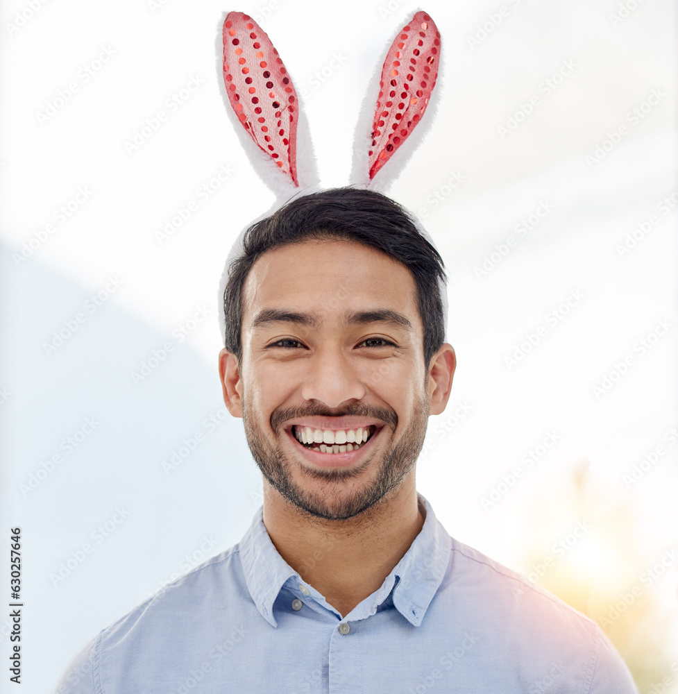 Bunny ears, holiday and business man portrait with a smile from easter and creative job pride. Celeb