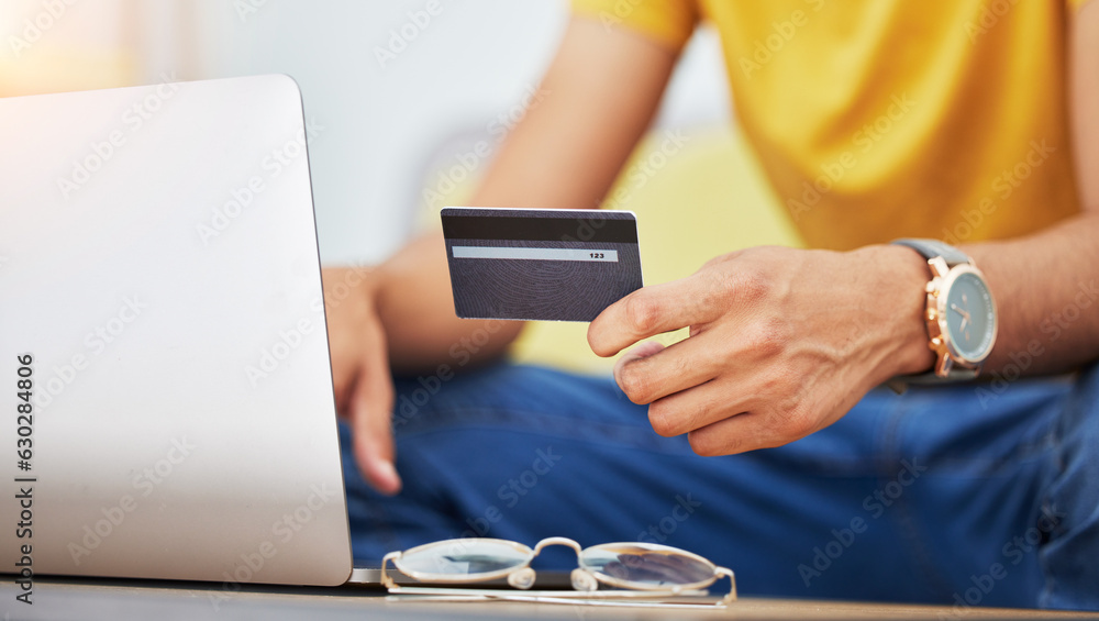 Credit card, hand and laptop for online shopping, sale and payment with technology at home. Web bank