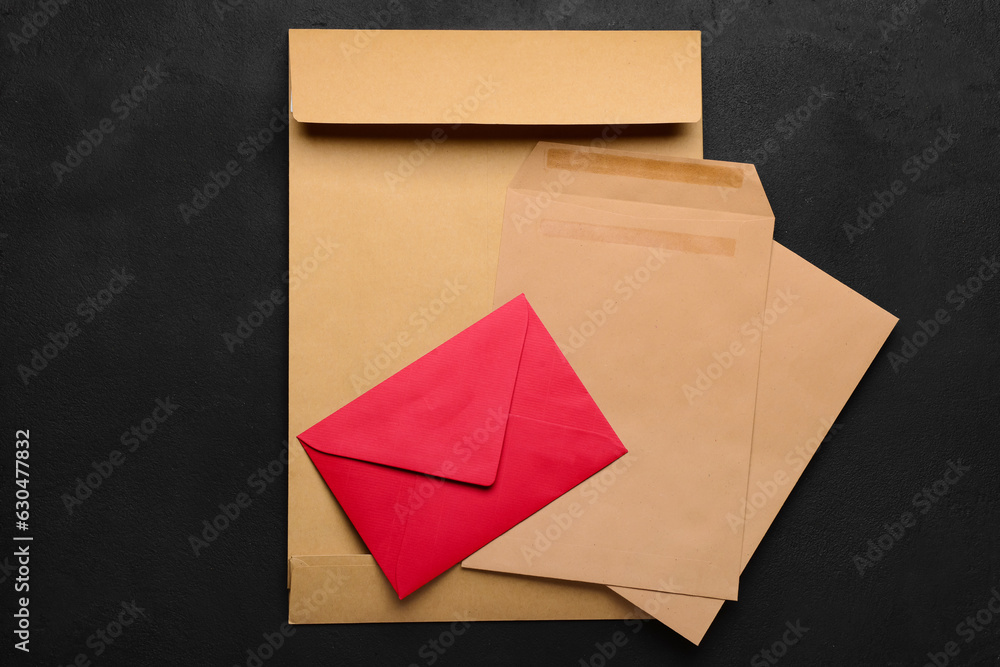 Different envelopes on dark background