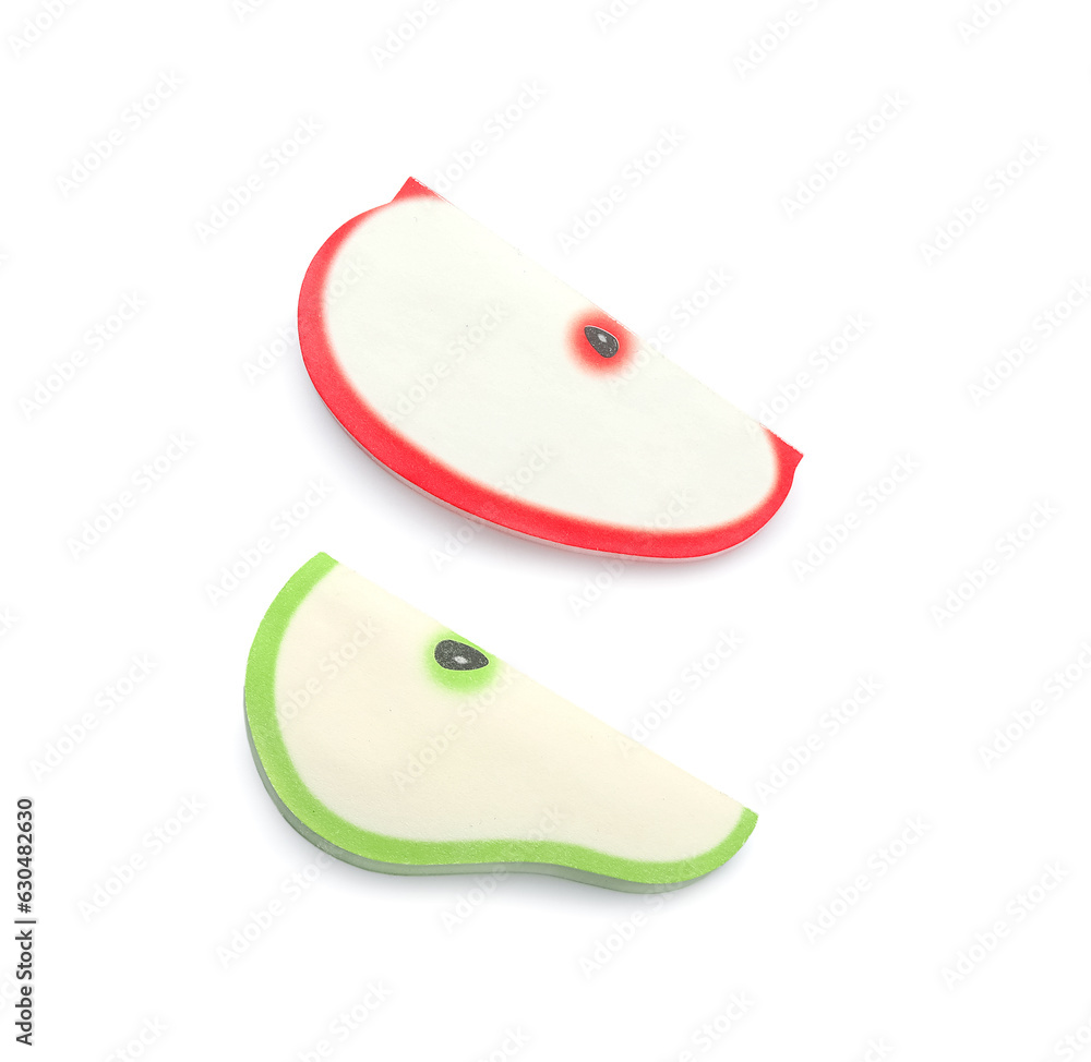 Sticky notes in shape of fruits on white background