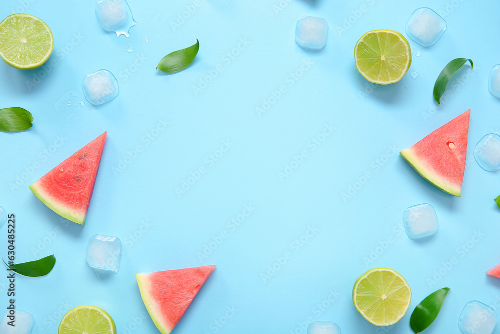 Frame made of fresh watermelon, lime and ice cubes on blue background