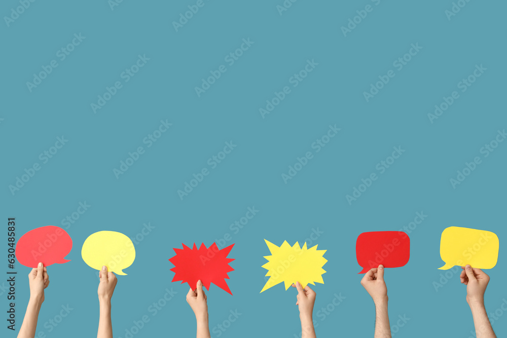 Different hands with speech bubbles on blue background