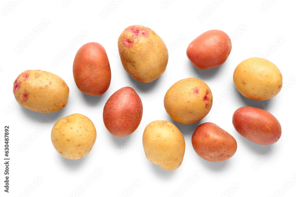 Fresh raw potatoes on white background