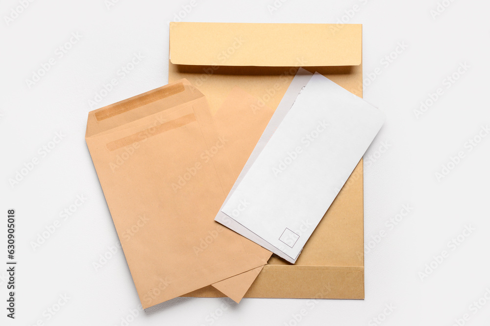 Letters and envelopes on light background