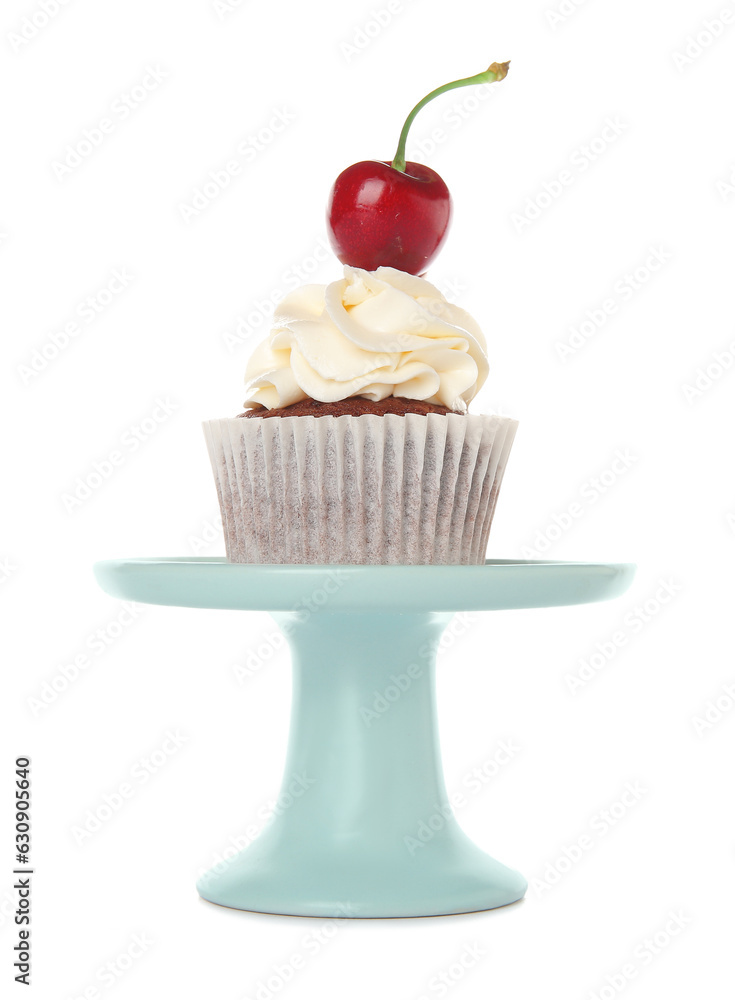 Stand with tasty cherry cupcake on white background