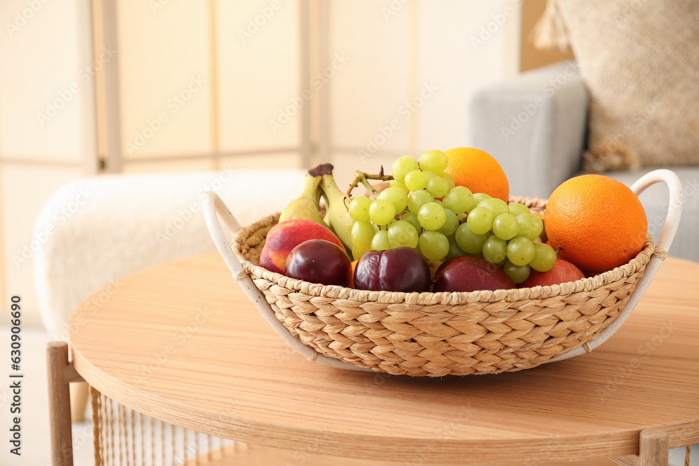 Fruit basket on coffee table in living room, closeup