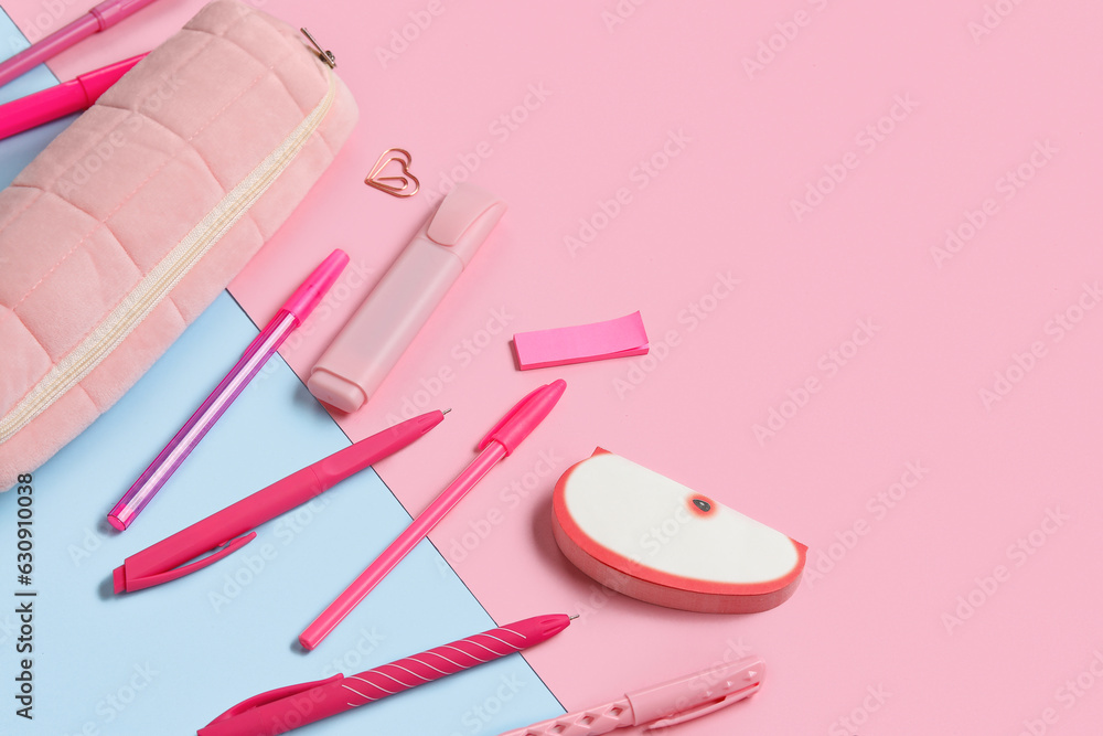 Pencil case with different school stationery on color background, closeup