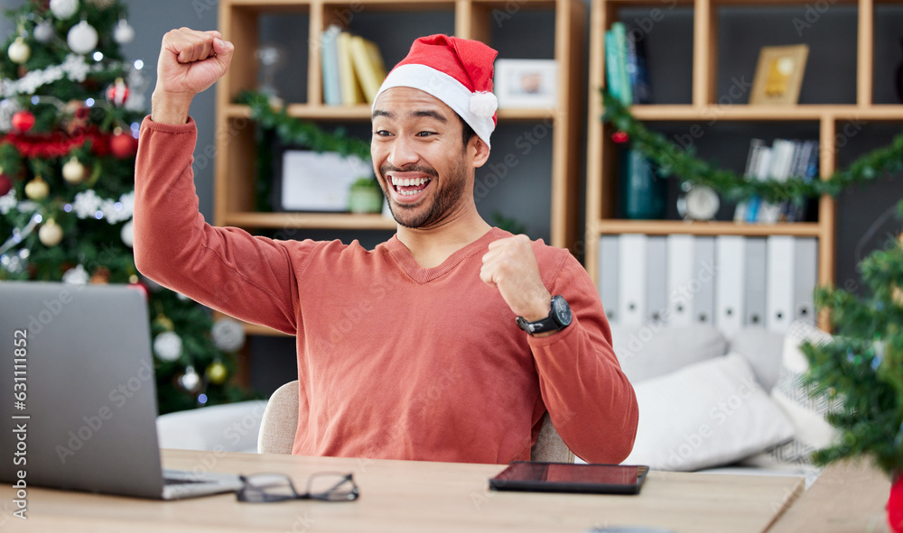 Laptop, christmas and remote work with a winner man in his home office for the celebration of an ach