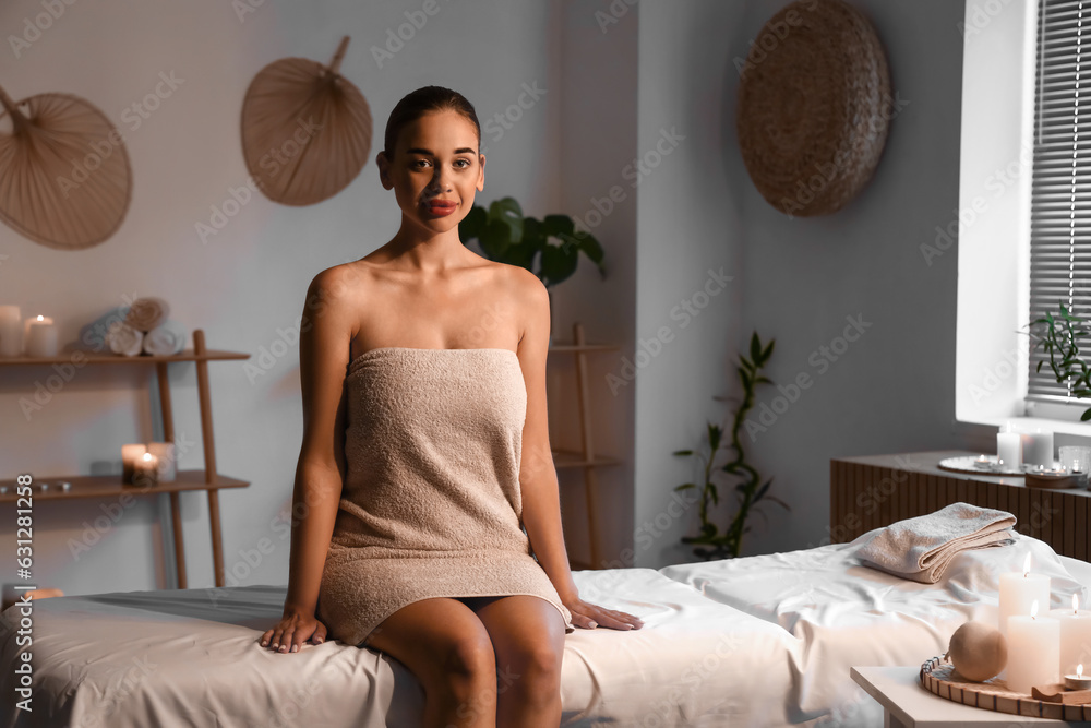 Portrait of pretty young woman in spa salon