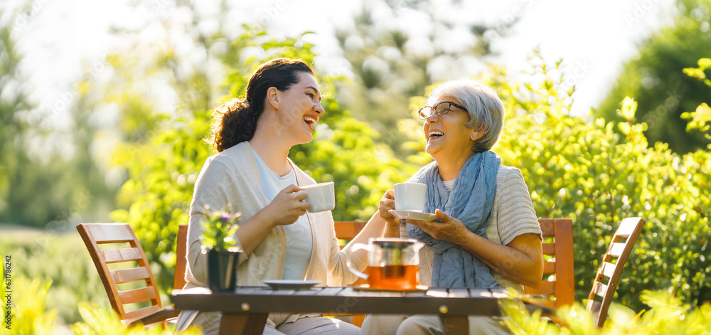 women drinking tea in the garden