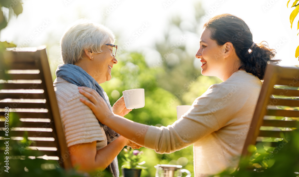 women drinking tea in the garden