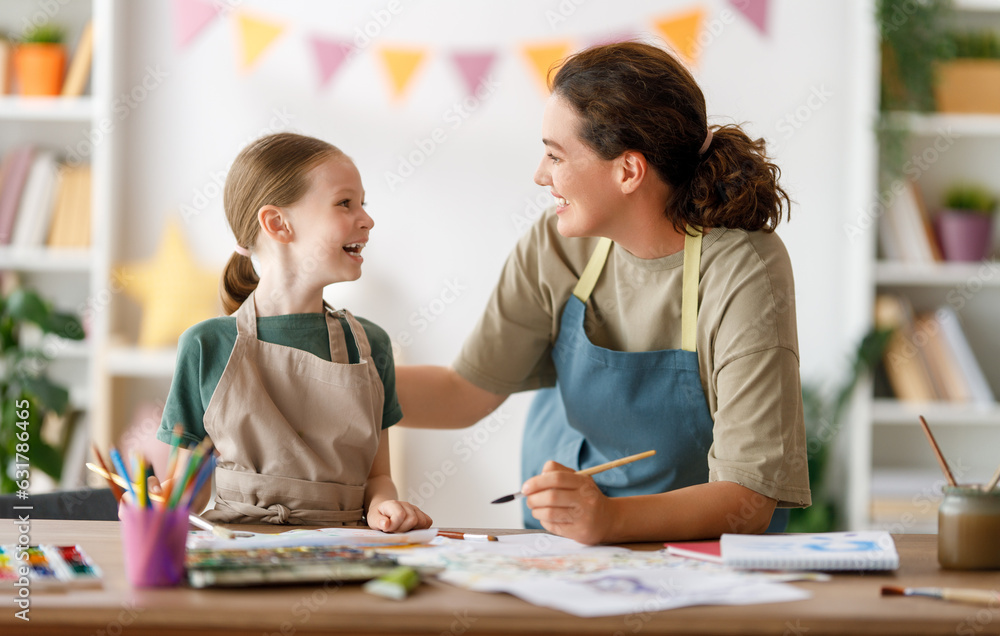 kid and teacher at the art class