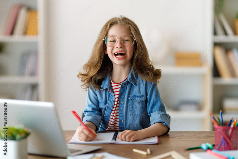 Girl doing homework or online education.