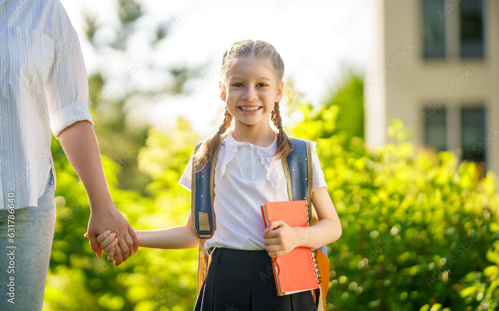 Parent and kid going to school