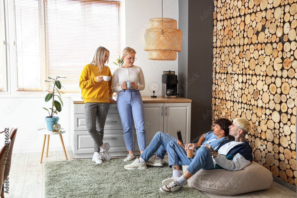 Team of graphic designers drinking coffee in office