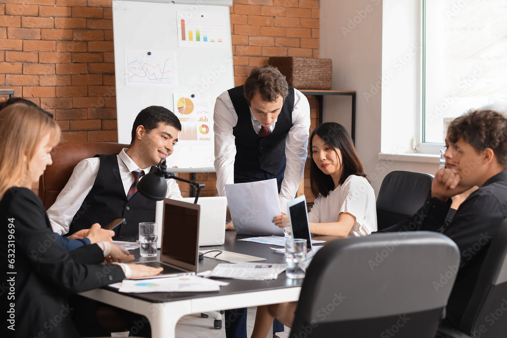 Group of business consultants working in office