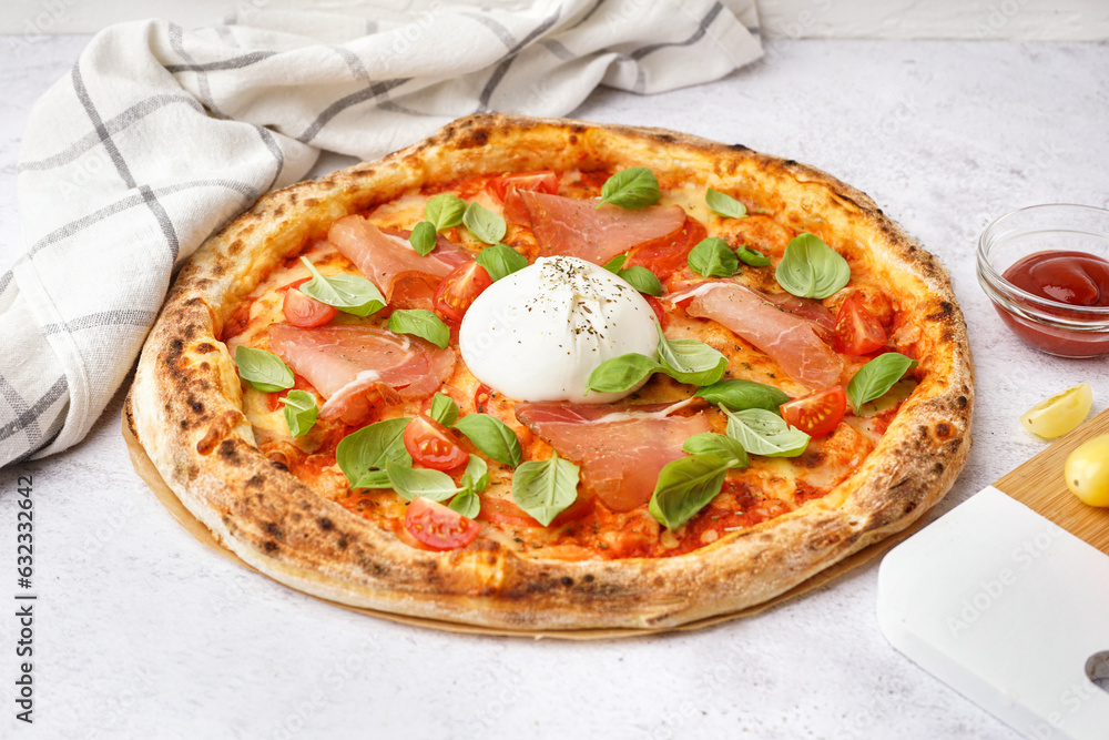 Tasty pizza with Burrata cheese on light background