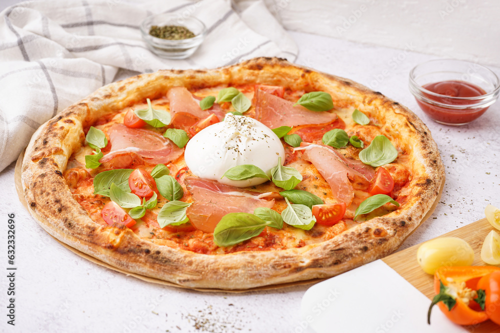 Tasty pizza with Burrata cheese on light background