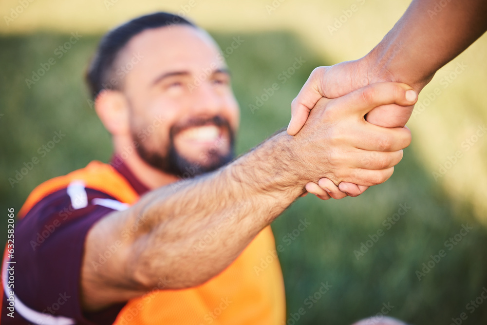 Hands, rugby and teamwork with a man helping a friend while training together on a stadium field for