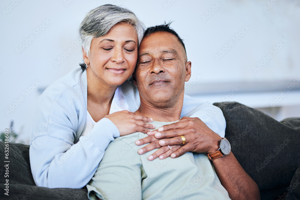 Love, romance and a senior couple on a sofa in the living room of their home together during retirem