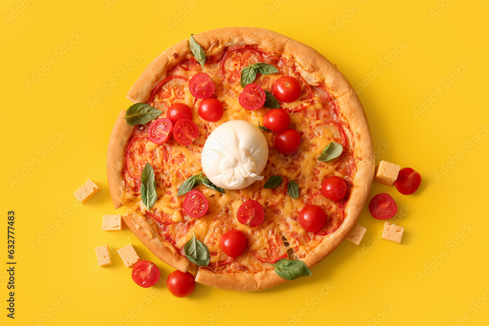 Tasty pizza with Burrata cheese on yellow background