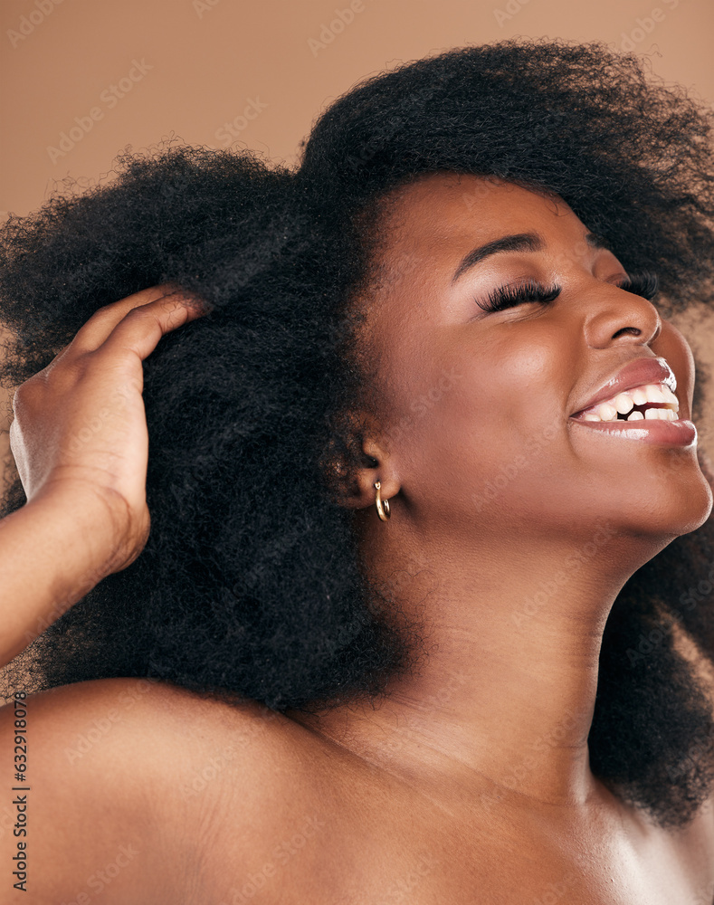 Happy, black woman or hair care for afro, natural beauty or cosmetics on a brown studio background. 