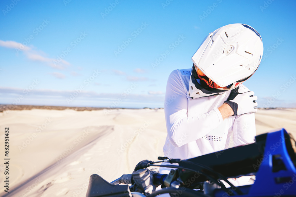 Stretching, shoulder pain and person on motorbike with a strain or injury in desert ready for extrem