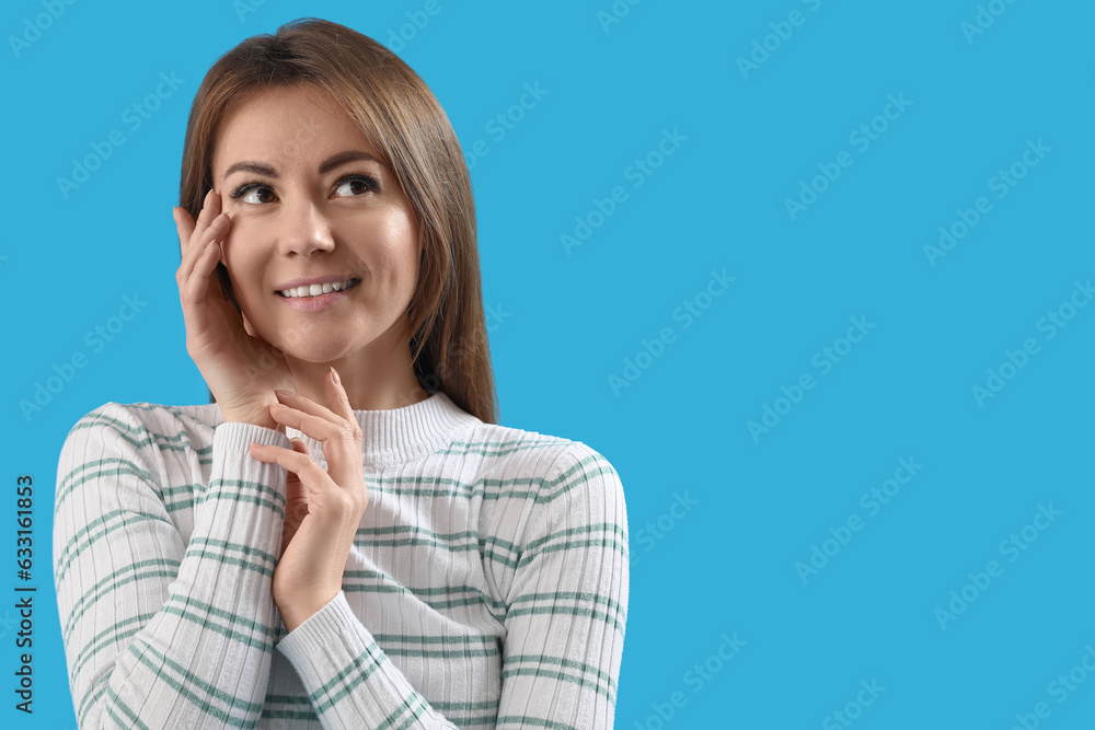 Beautiful woman on blue background