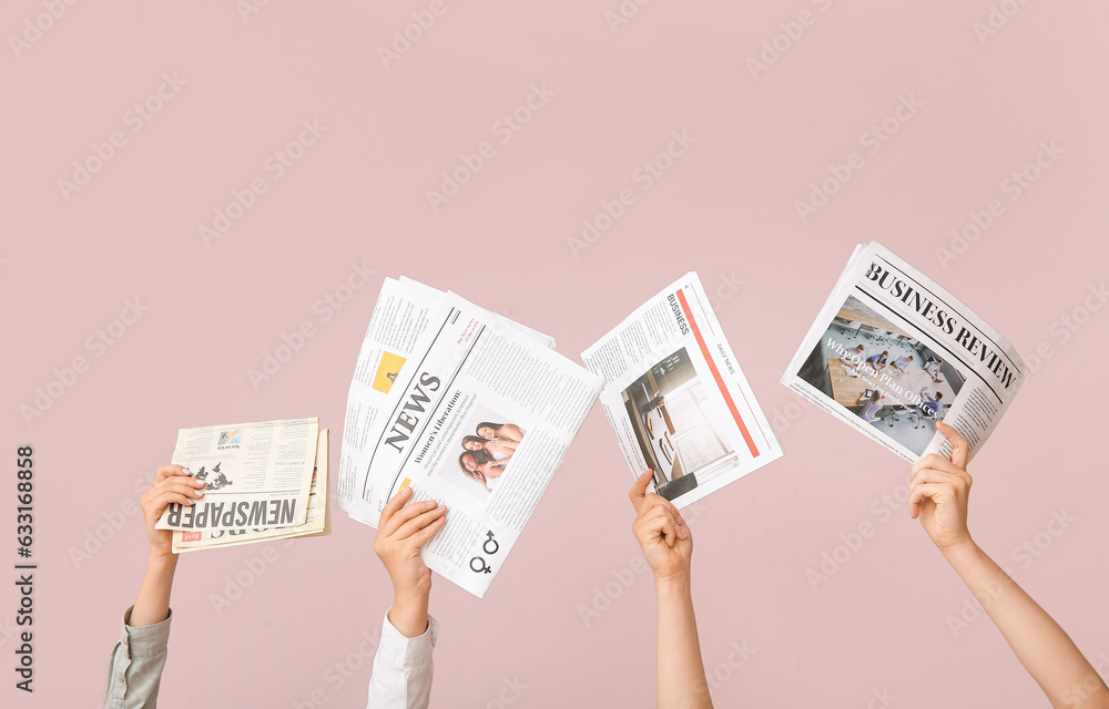 Female hands with different newspapers on color background