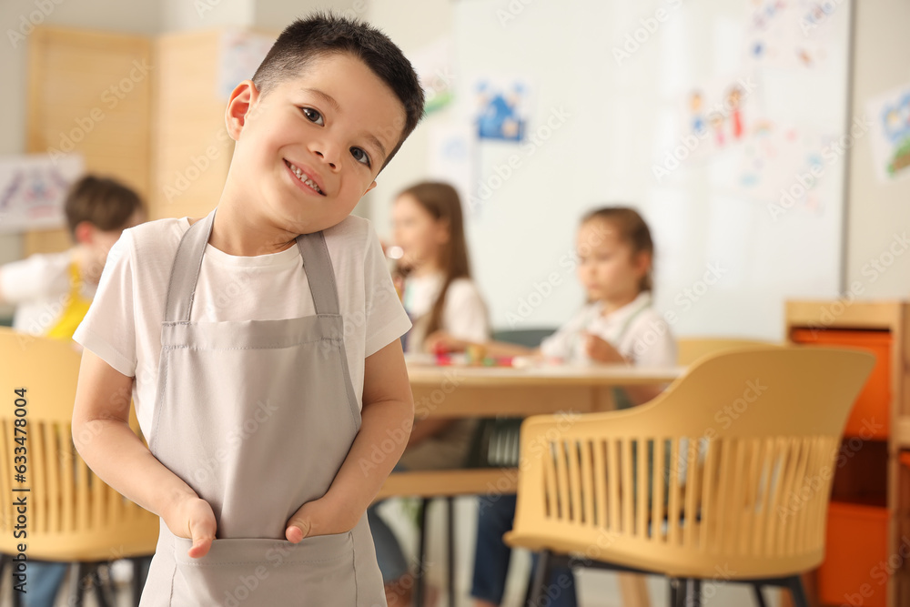 Cute little boy in art class