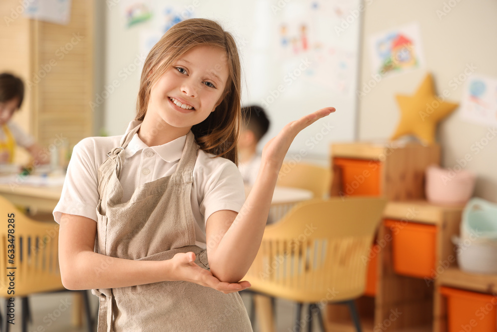 Little girl in art class