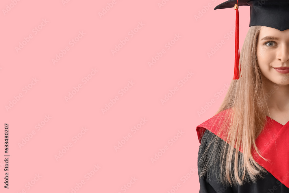 Female graduate student on pink background