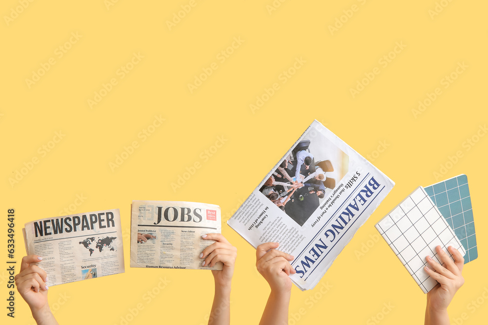 Female hands with newspapers and notebooks on color background