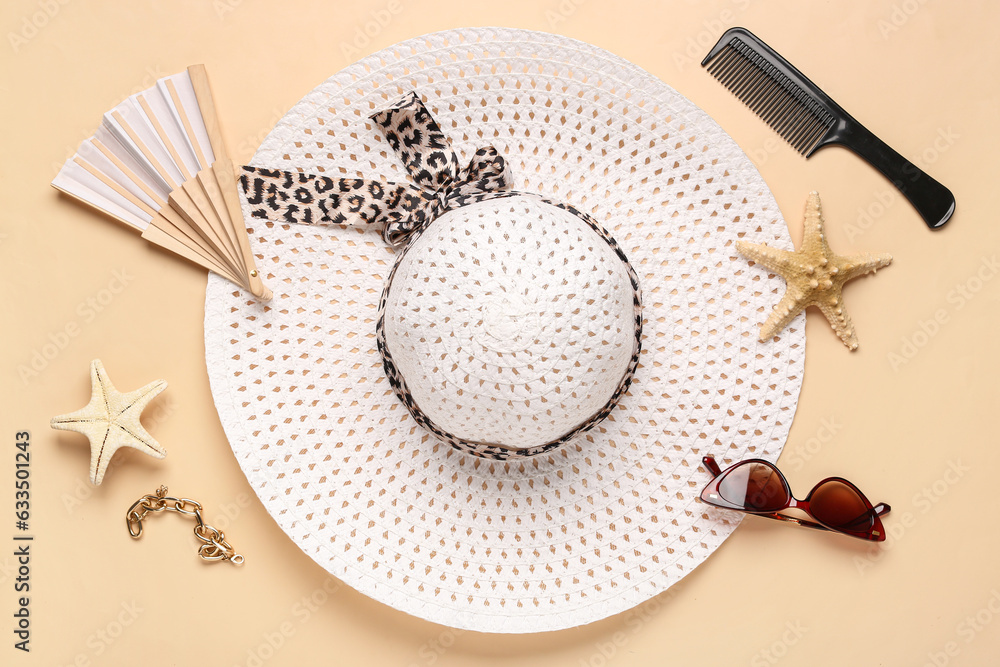 Composition with female beach accessories and hair comb on color background