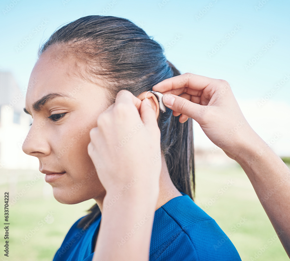 Hands, profile and woman in hearing aid, ear and sound amplifier at park outdoor. Help, person with 