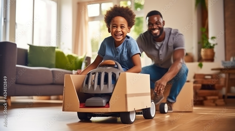 Father and son are playing at home with pretend car in a box