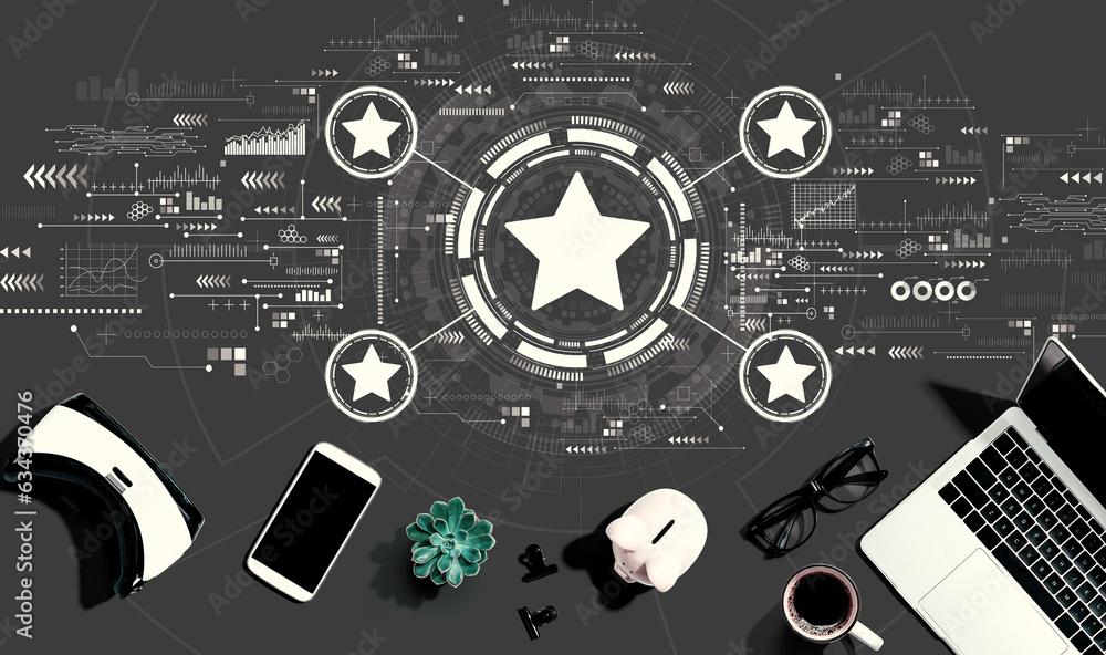 Rating star concept with electronic gadgets and office supplies - flat lay