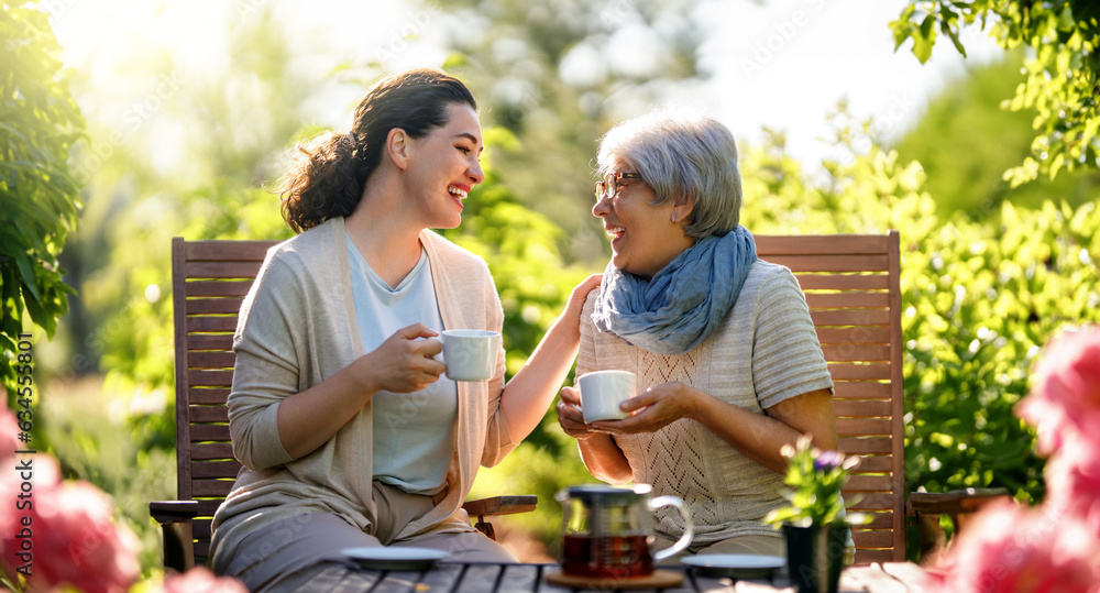 women drinking tea in the garden