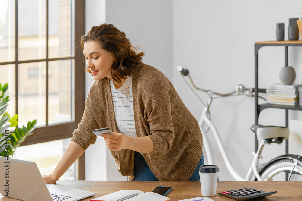 Woman is doing online purchases