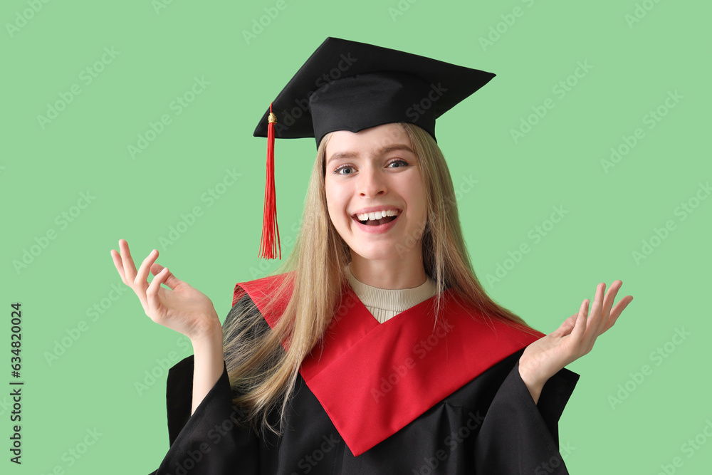 Female graduate student on green background