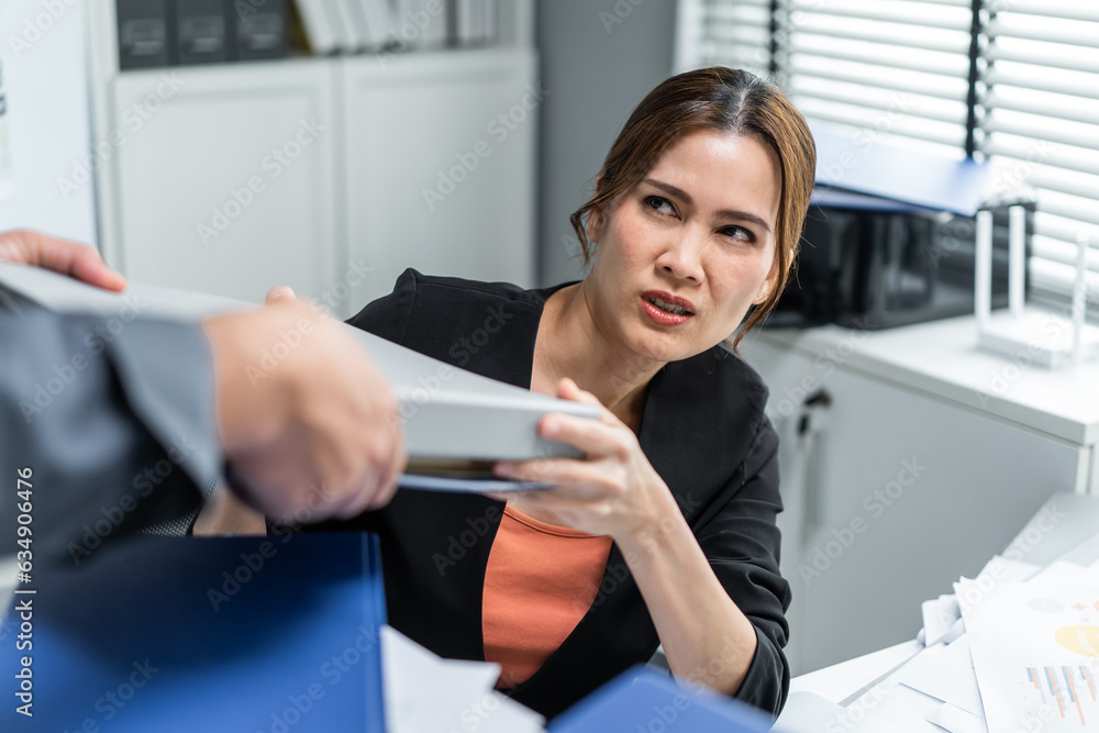 Asian frustrated angry businesswoman follow direction from boss in office. 