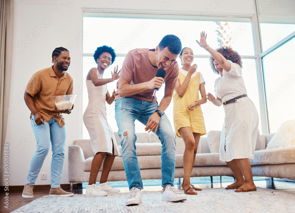 Singing, party and friends dancing in the living room with a microphone to music, playlist or radio.