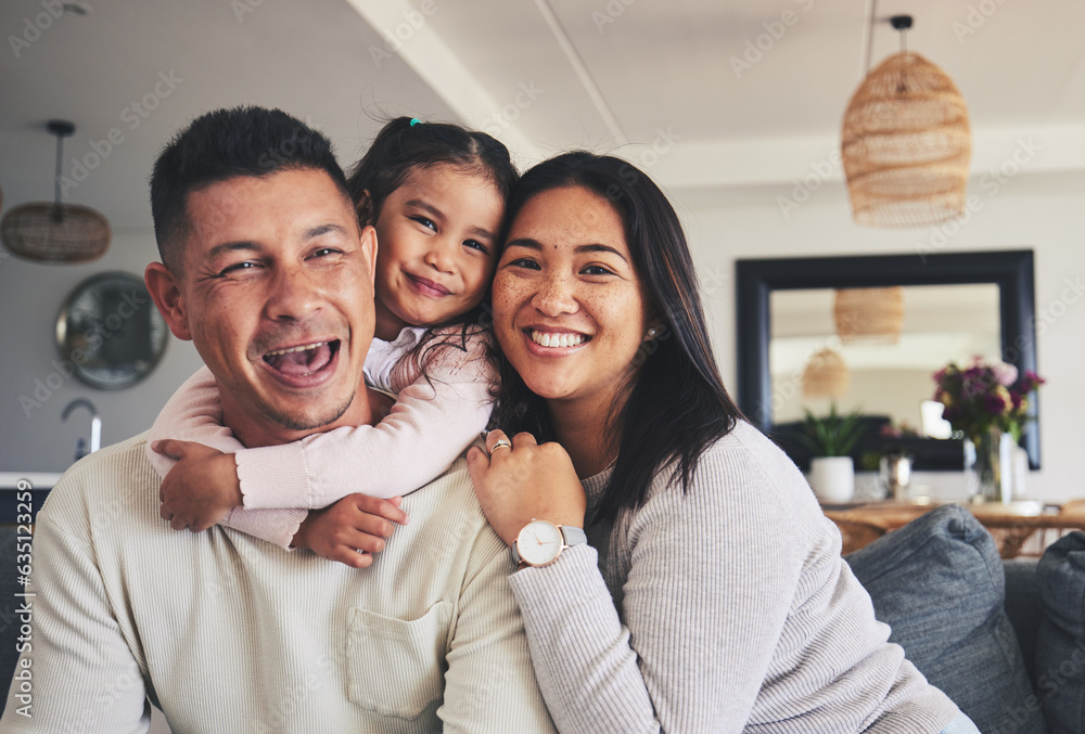 Hug, smile and portrait of girl with her parents bonding together in the living room of their home. 